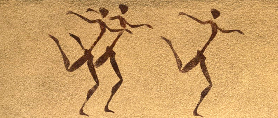 Prehistoric rock art showing three stylized human figures in dynamic dancing poses against a textured ochre background.