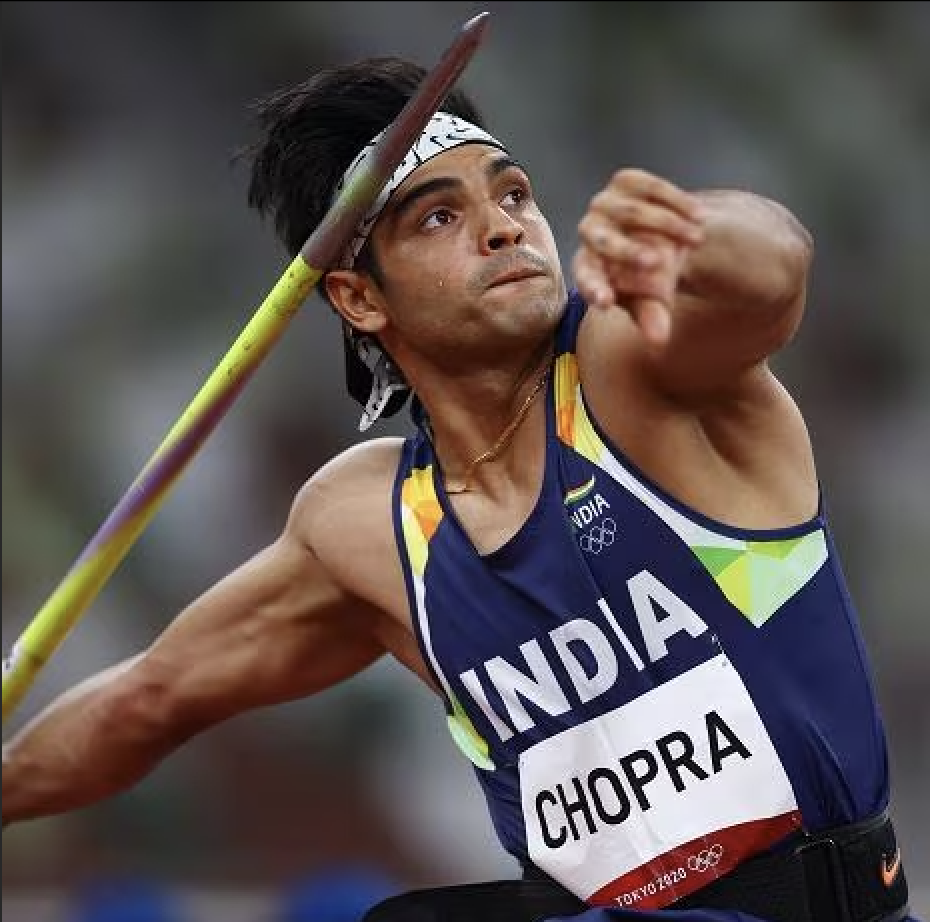 Neeraj Chopra of India mid-throw in javelin competition at Tokyo 2020 Olympics