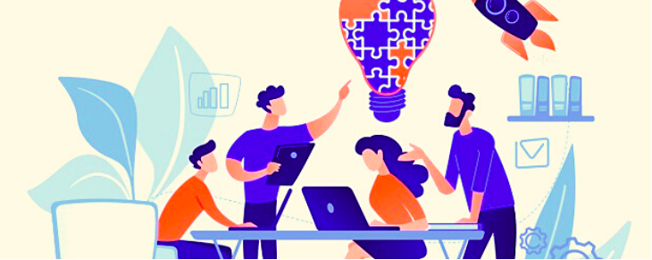 Illustration of four team members collaborating around laptops with a puzzle-piece lightbulb above them symbolizing shared